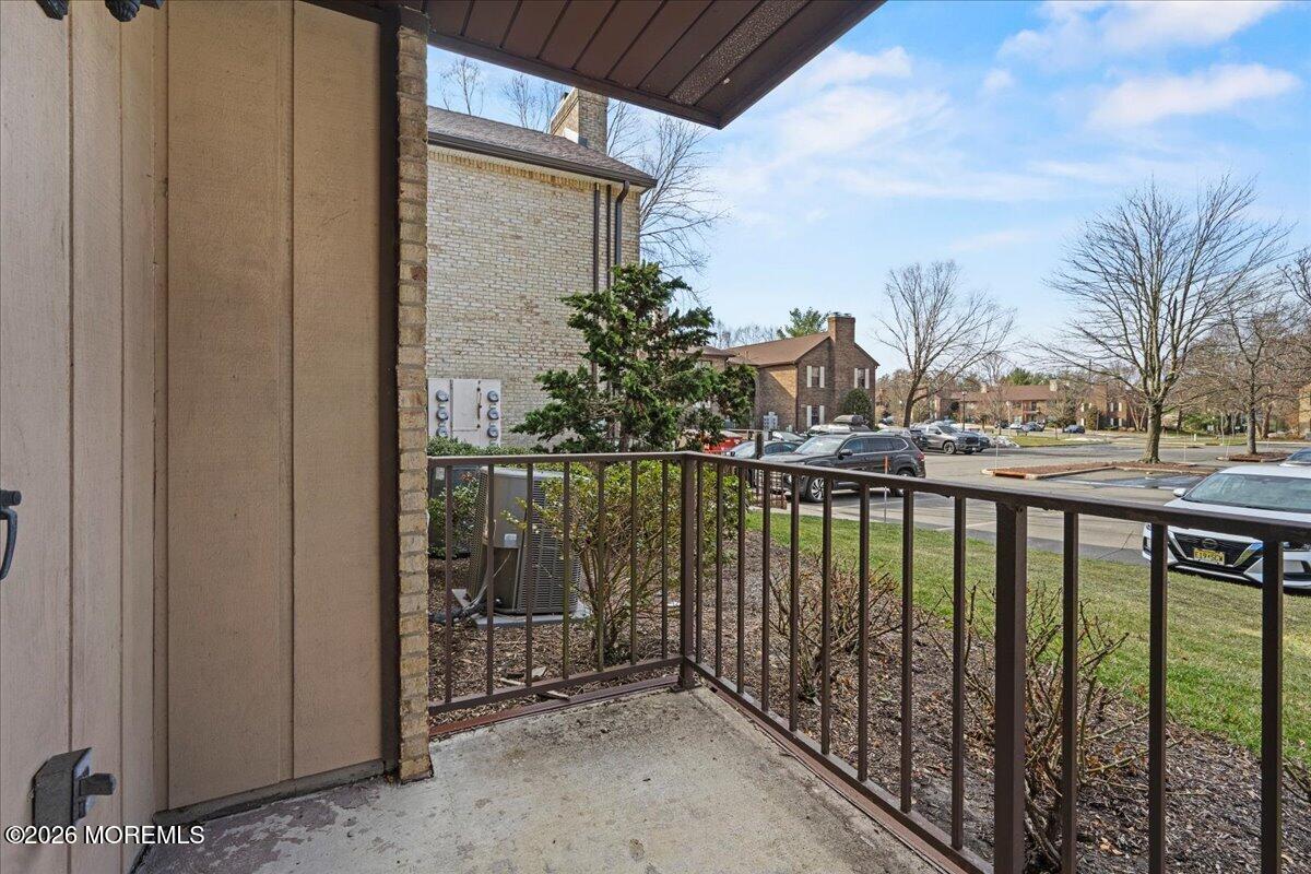 405 Wellington Place Matawan, NJ 07747 - Photo 25 of 29 a view of a balcony with an outdoor space