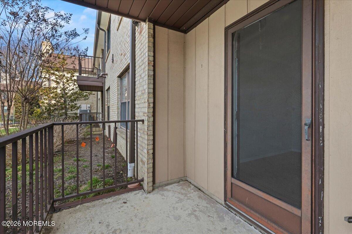405 Wellington Place Matawan, NJ 07747 - Photo 27 of 29 a view of a balcony