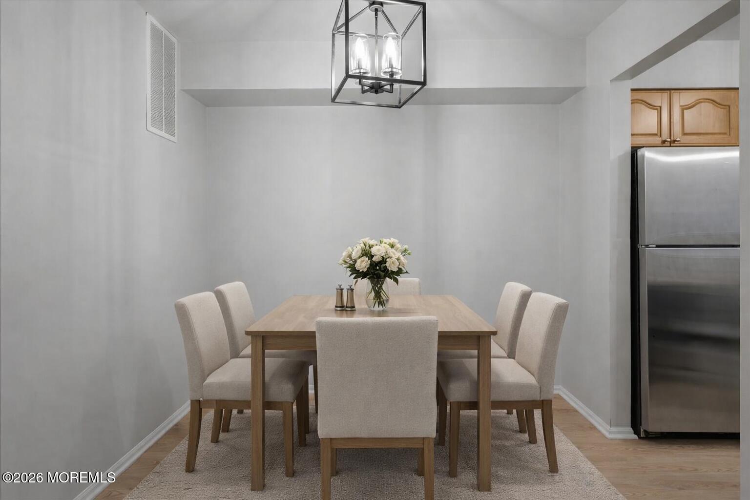 405 Wellington Place Matawan, NJ 07747 - Photo 9 of 29 a dining room with furniture and window