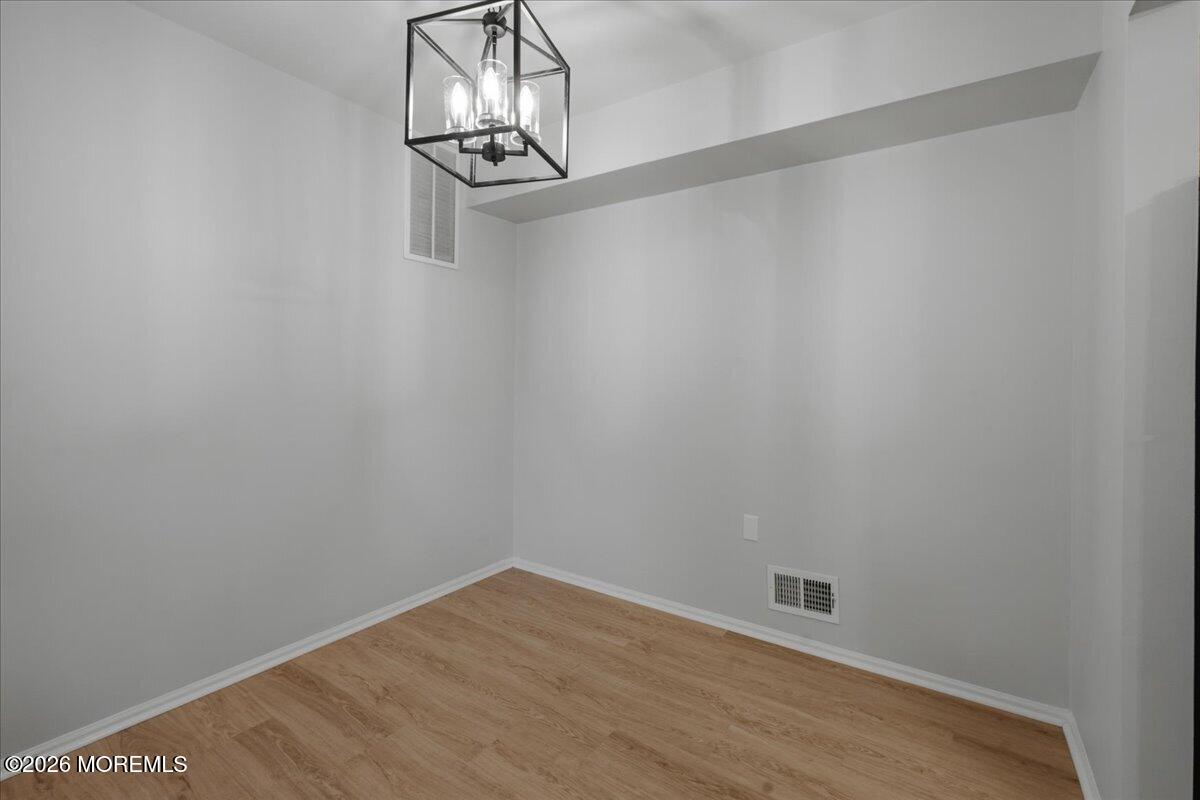 405 Wellington Place Matawan, NJ 07747 - Photo 10 of 29 a view of a room with wooden floor