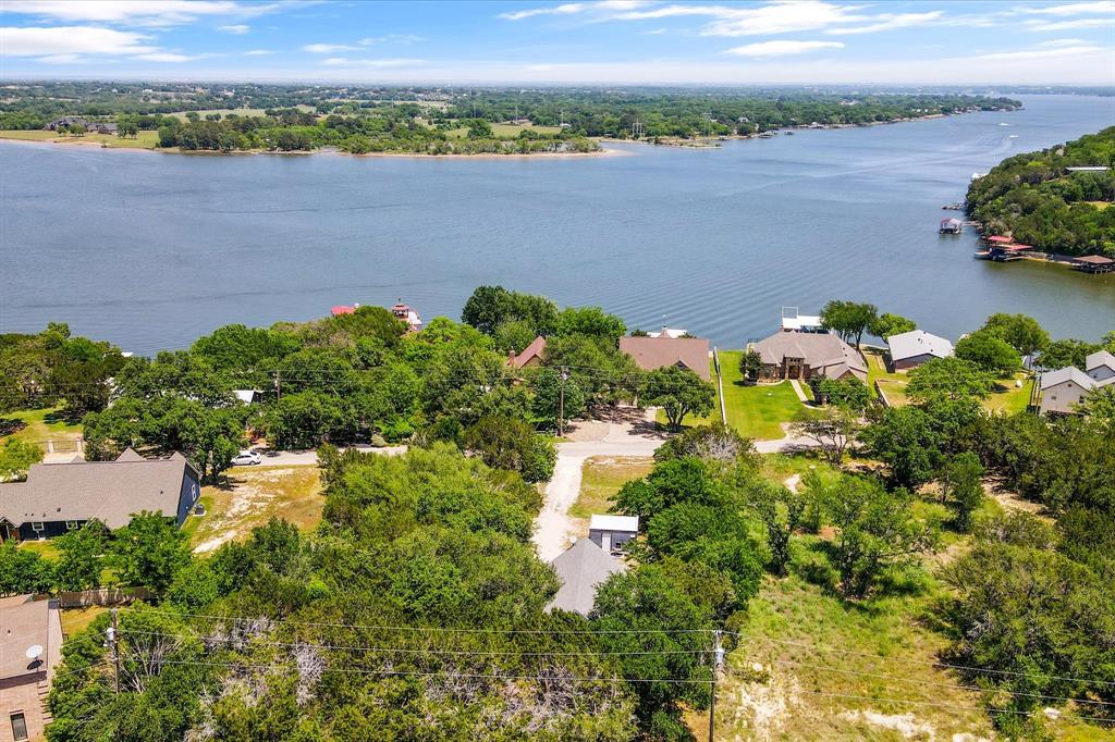 a view of a lake with a house in the background