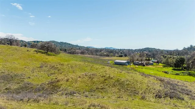 a view of mountain view with mountains in the background