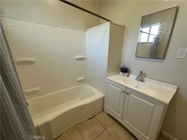 a bathroom with a sink and a bathtub