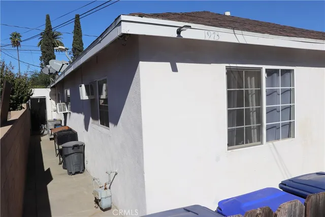 a kitchen with a refrigerator and a stove