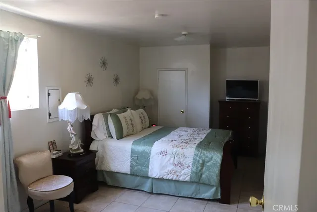 a bed room with a bed and furniture