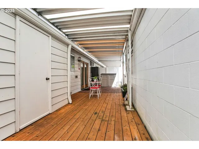a view of a backyard with a garden and plants
