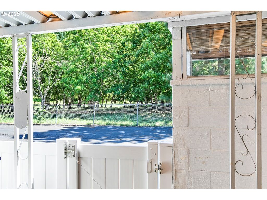 569 Northeast Fleming Avenue Gresham, OR 97030 - Photo 22 of 32 a view of a backyard with a garden and plants