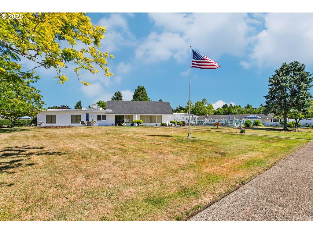 569 Northeast Fleming Avenue Gresham, OR 97030 - Photo 29 of 32 a front view of a house with a swimming pool