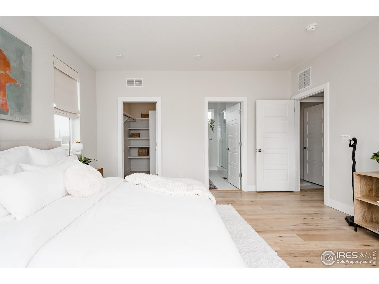 741 24th Street Denver, CO 80205 - Photo 21 of 44 walk-in closet and bath off primary bedroom