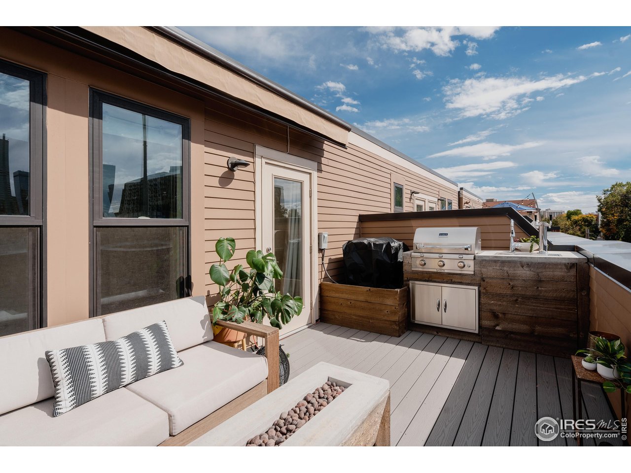 741 24th Street Denver, CO 80205 - Photo 33 of 44 Patio grill, tap, gas fire place and sectional included