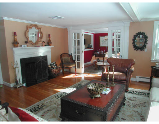 49 Madison Road Wellesley, MA 02481 - Photo 2 of 18 a living room with furniture and a fireplace