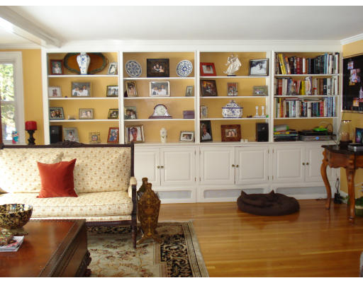 49 Madison Road Wellesley, MA 02481 - Photo 4 of 18 a living room with furniture and a book shelf