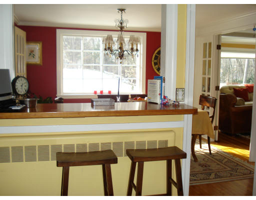 49 Madison Road Wellesley, MA 02481 - Photo 8 of 18 a view of a dining room with furniture window and outside view
