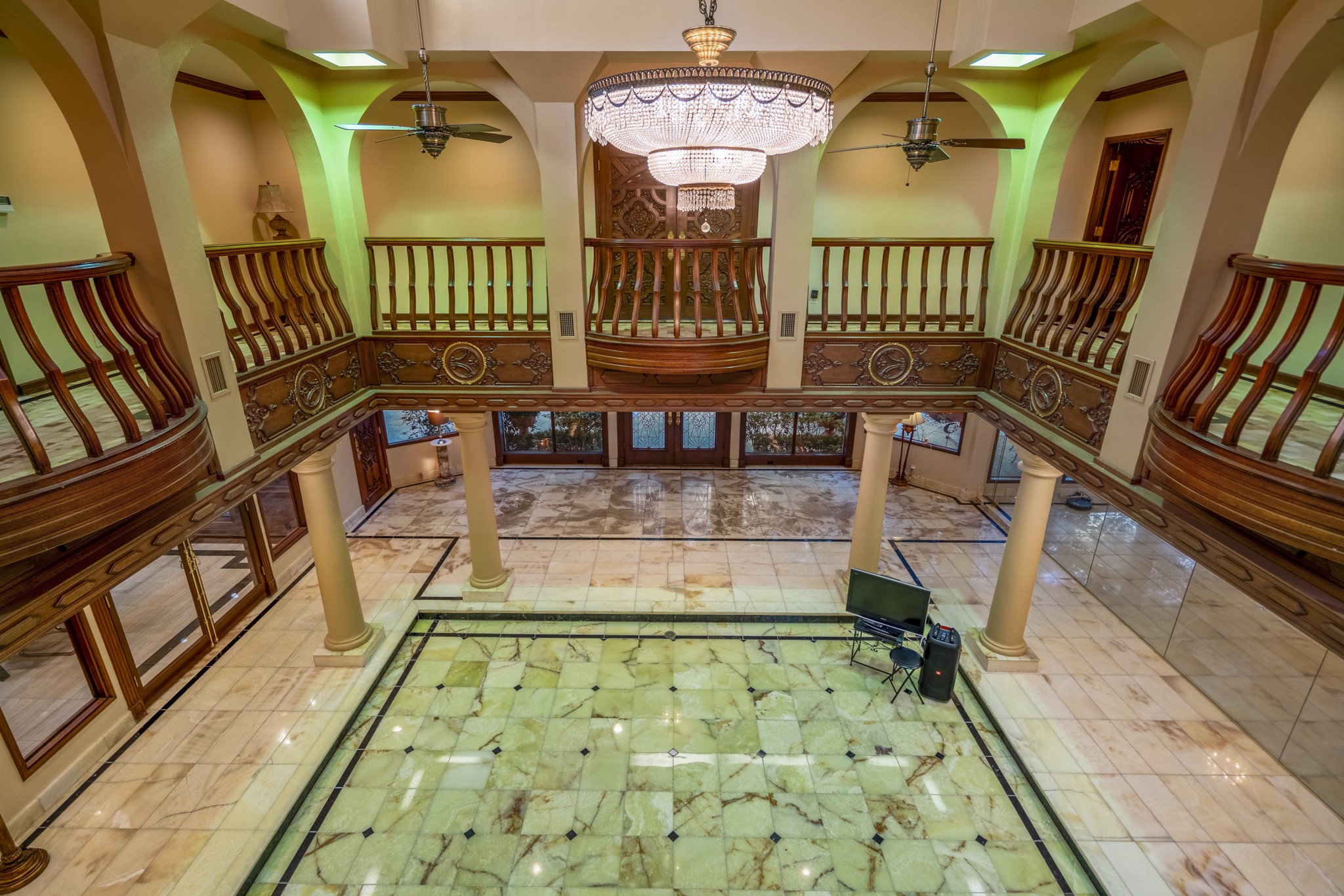 6535 Buffalo Speedway Houston, TX 77005 - Photo 19 of 34 A view across the great room reveals just how impressive this central space truly is. High ceilings, natural light, and artisan detailing bring it all together.