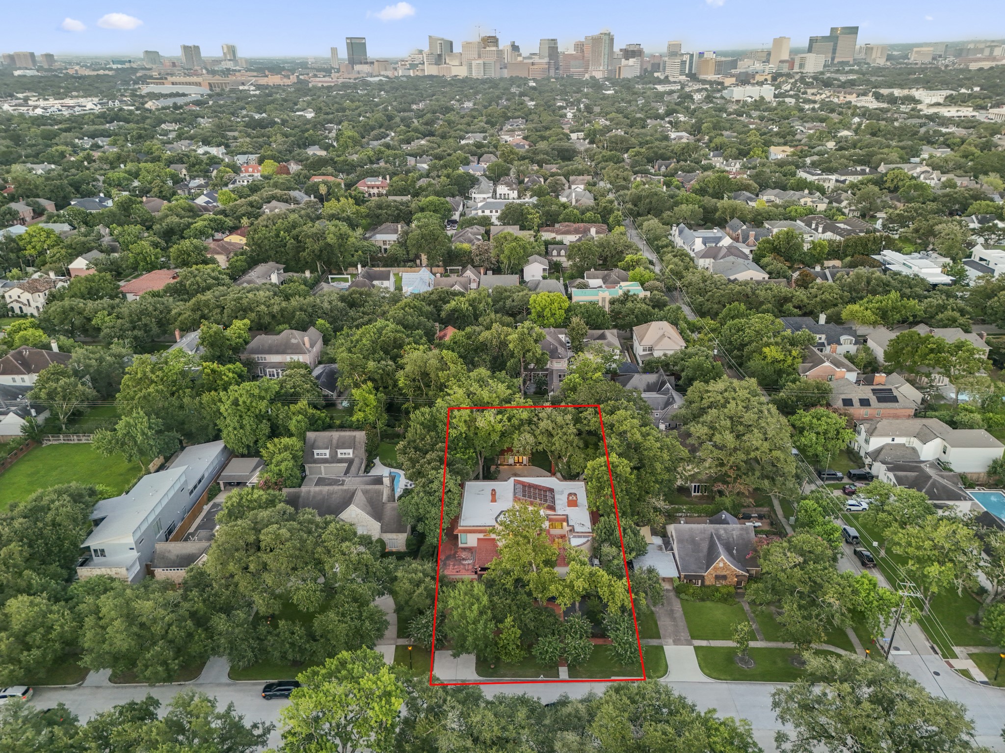 6535 Buffalo Speedway Houston, TX 77005 - Photo 2 of 34 Set on an extraordinary 20,000 square foot lot, this aerial view captures the scale and privacy of one of the largest homesites in the neighborhood. A rare opportunity in prestigious West University!