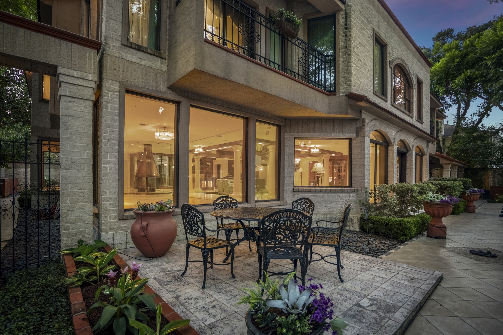 6535 Buffalo Speedway Houston, TX 77005 - Photo 31 of 34 Enjoy outdoor dining or quiet evenings on this spacious patio just off the main living areas. Beautifully tiled and comfortably shaded.
