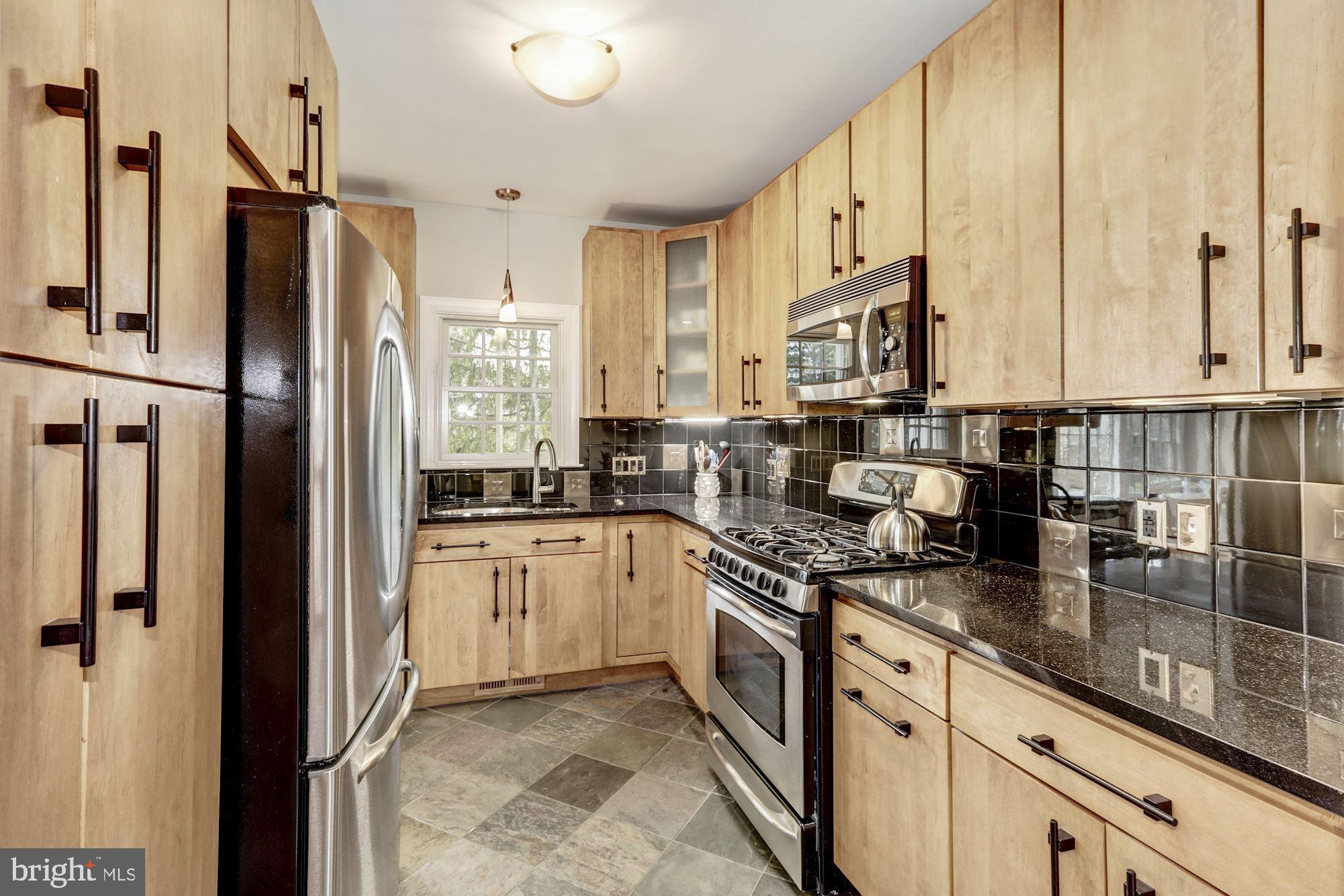 9608 Clearview Place Silver Spring, MD 20901 - Photo 10 of 31 Beautiful 42" warm wood cabinetry