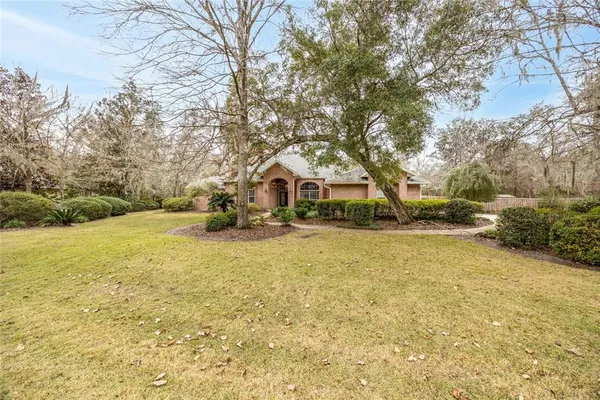 a house with trees in front of it