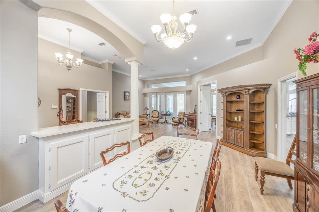 5922 Northwest 72 Street Gainesville, FL 32653 - Photo 17 of 52 a large kitchen with a table and chairs