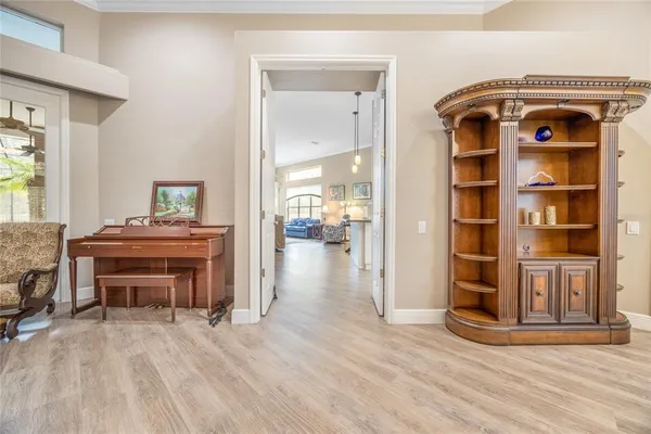 a view of livingroom with furniture and workspace
