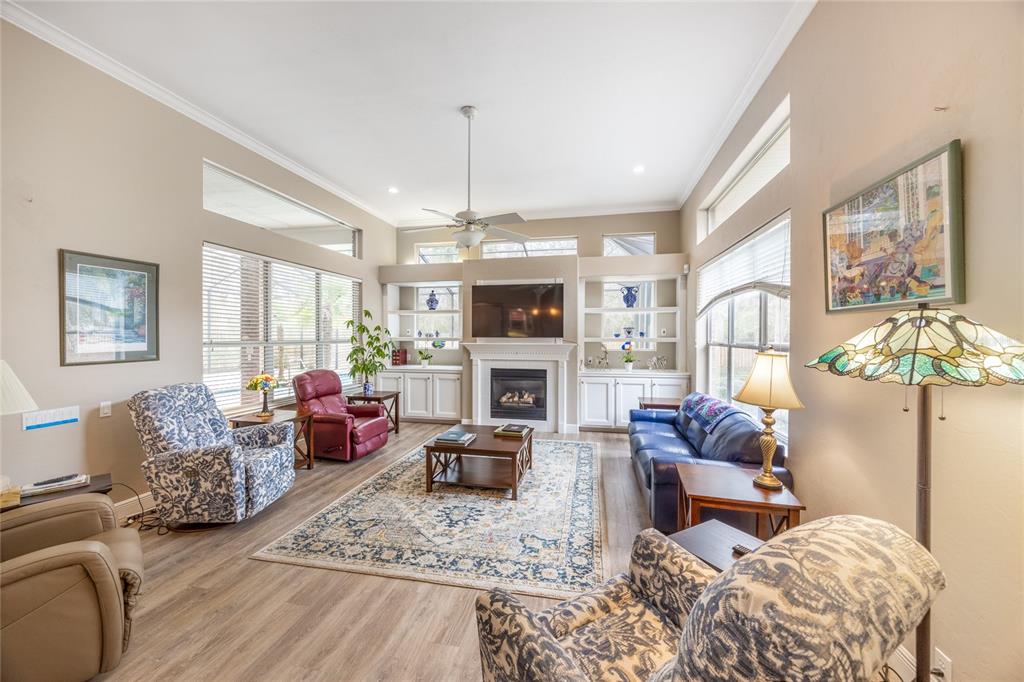 5922 Northwest 72 Street Gainesville, FL 32653 - Photo 19 of 52 a living room with furniture fireplace and flat screen tv