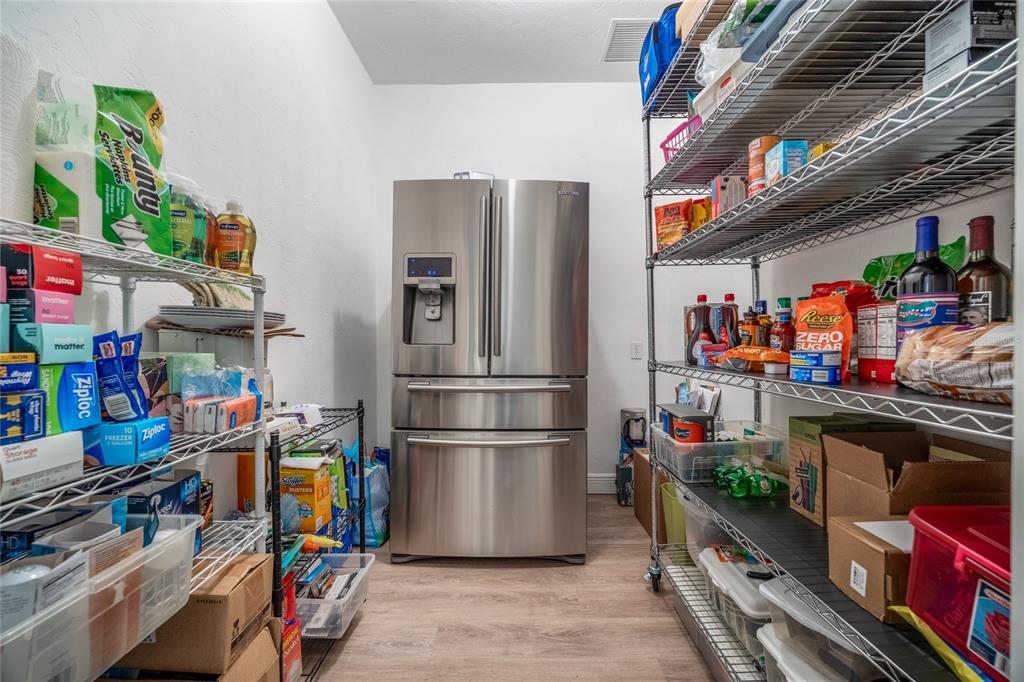5922 Northwest 72 Street Gainesville, FL 32653 - Photo 24 of 52 a storage room with washer and dryer