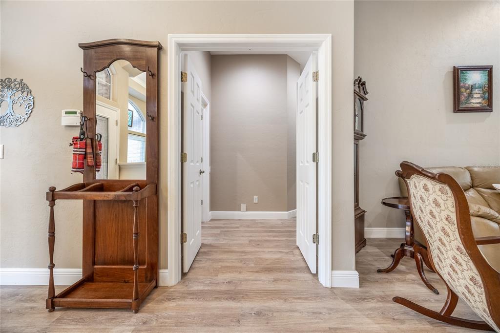 5922 Northwest 72 Street Gainesville, FL 32653 - Photo 25 of 52 a view of a livingroom with furniture and a hallway