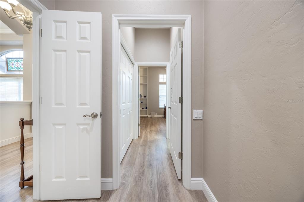 5922 Northwest 72 Street Gainesville, FL 32653 - Photo 34 of 52 a view of a hallway with wooden floor and closet area