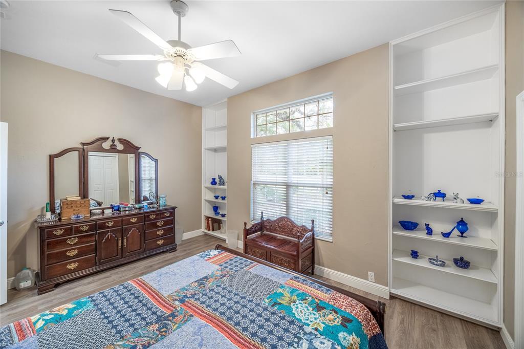 5922 Northwest 72 Street Gainesville, FL 32653 - Photo 36 of 52 a bedroom with furniture and a window