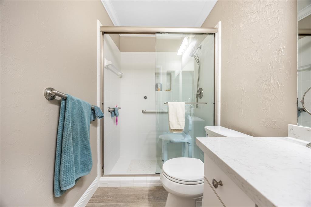 5922 Northwest 72 Street Gainesville, FL 32653 - Photo 37 of 52 a white toilet sitting next to a bathroom sink