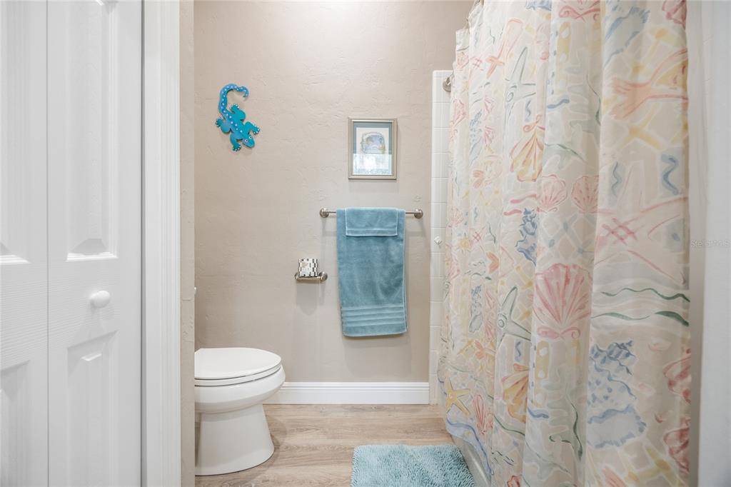 5922 Northwest 72 Street Gainesville, FL 32653 - Photo 42 of 52 a bathroom with a toilet and a shower