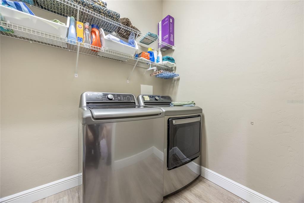5922 Northwest 72 Street Gainesville, FL 32653 - Photo 44 of 52 a utility room with dryer and washer