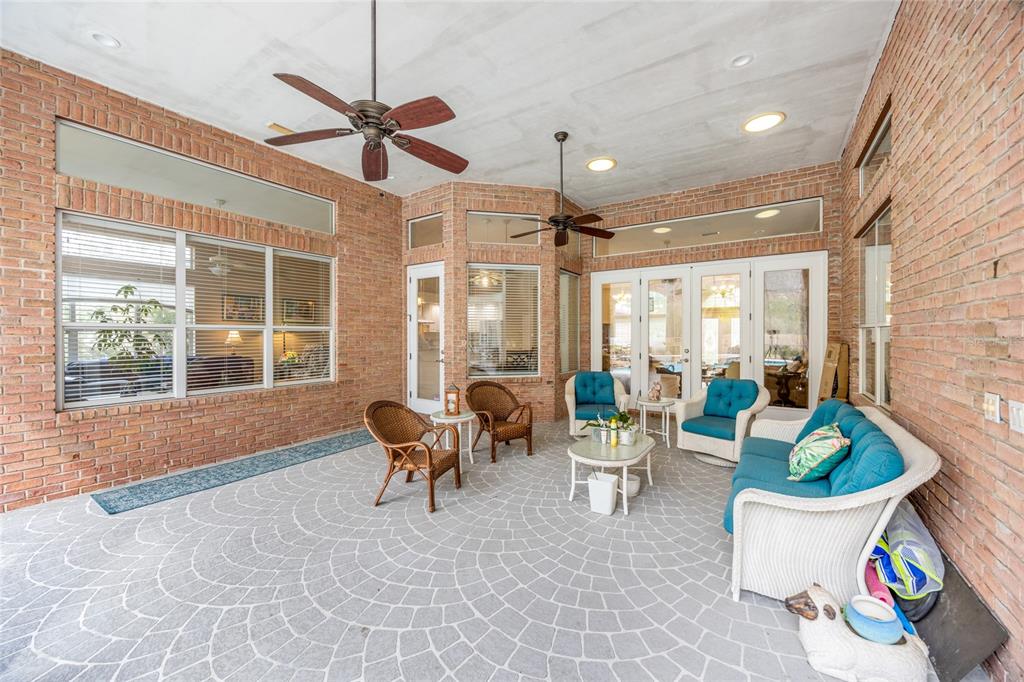 5922 Northwest 72 Street Gainesville, FL 32653 - Photo 49 of 52 a living room with furniture and a potted plant