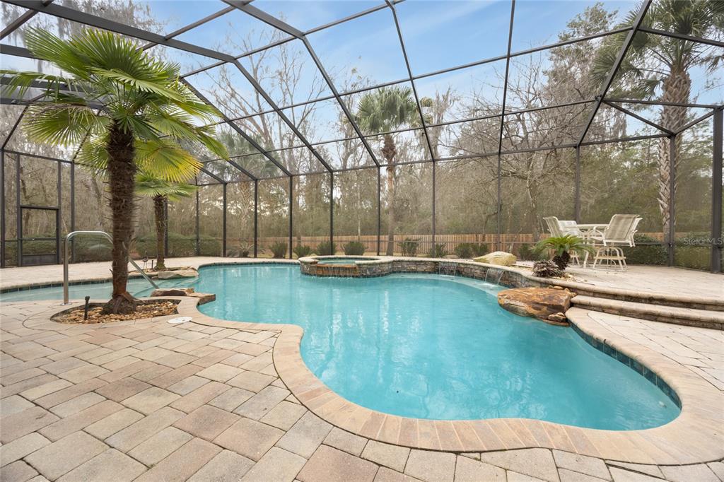 5922 Northwest 72 Street Gainesville, FL 32653 - Photo 50 of 52 a swimming pool with outdoor seating and yard