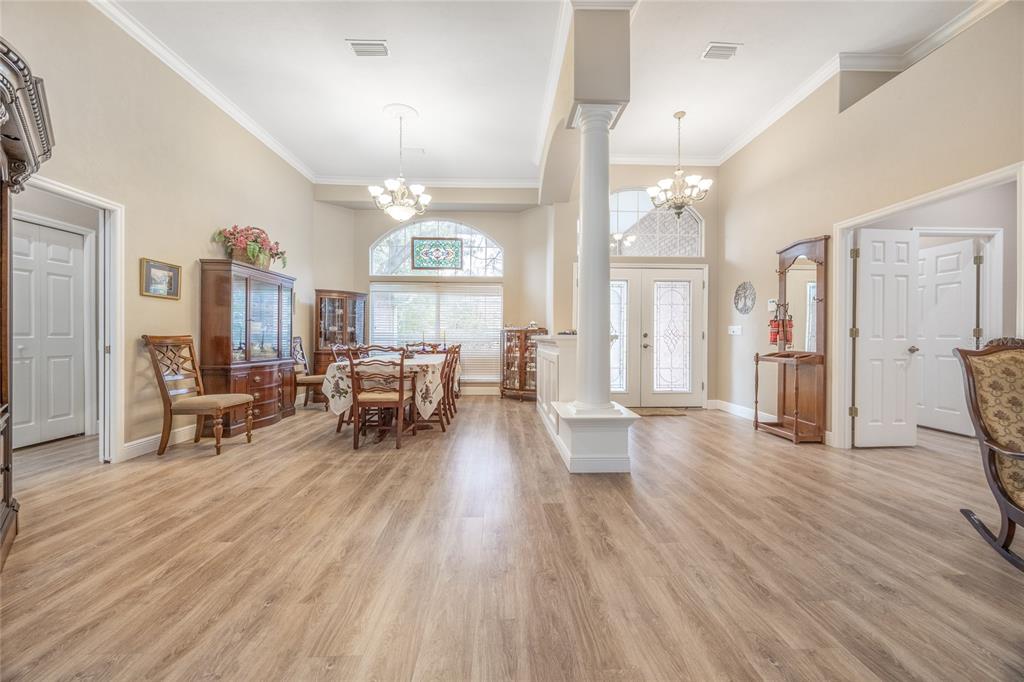 5922 Northwest 72 Street Gainesville, FL 32653 - Photo 5 of 52 a living room with furniture and a wooden floor