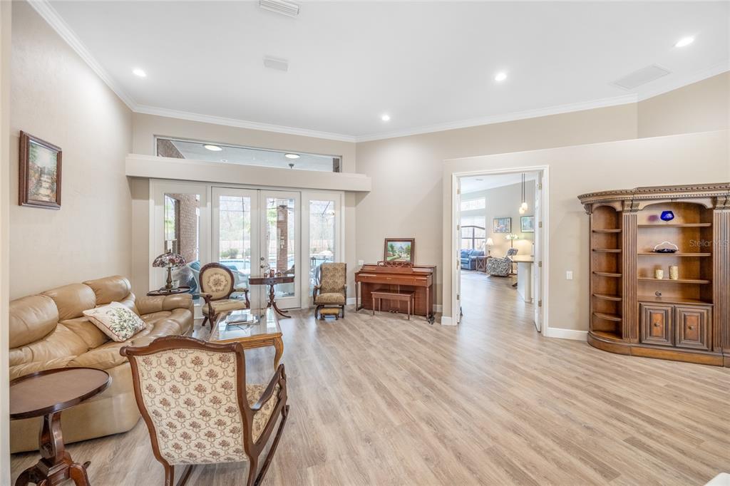 5922 Northwest 72 Street Gainesville, FL 32653 - Photo 6 of 52 a living room with furniture and wooden floor