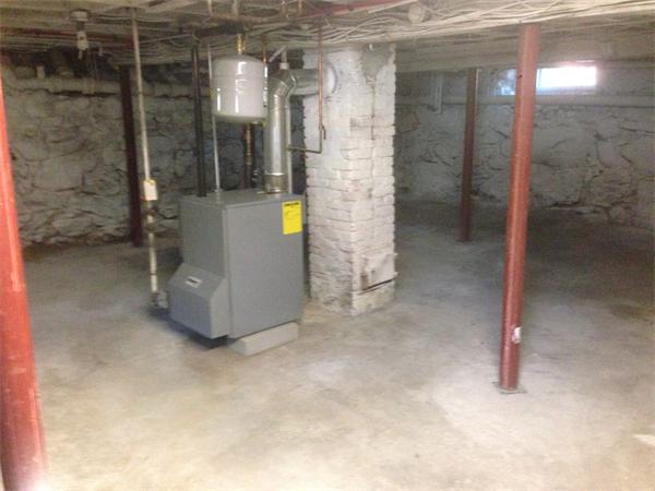 23 Emery Street Lowell, MA 01851 - Photo 4 of 5 a view of water heater room