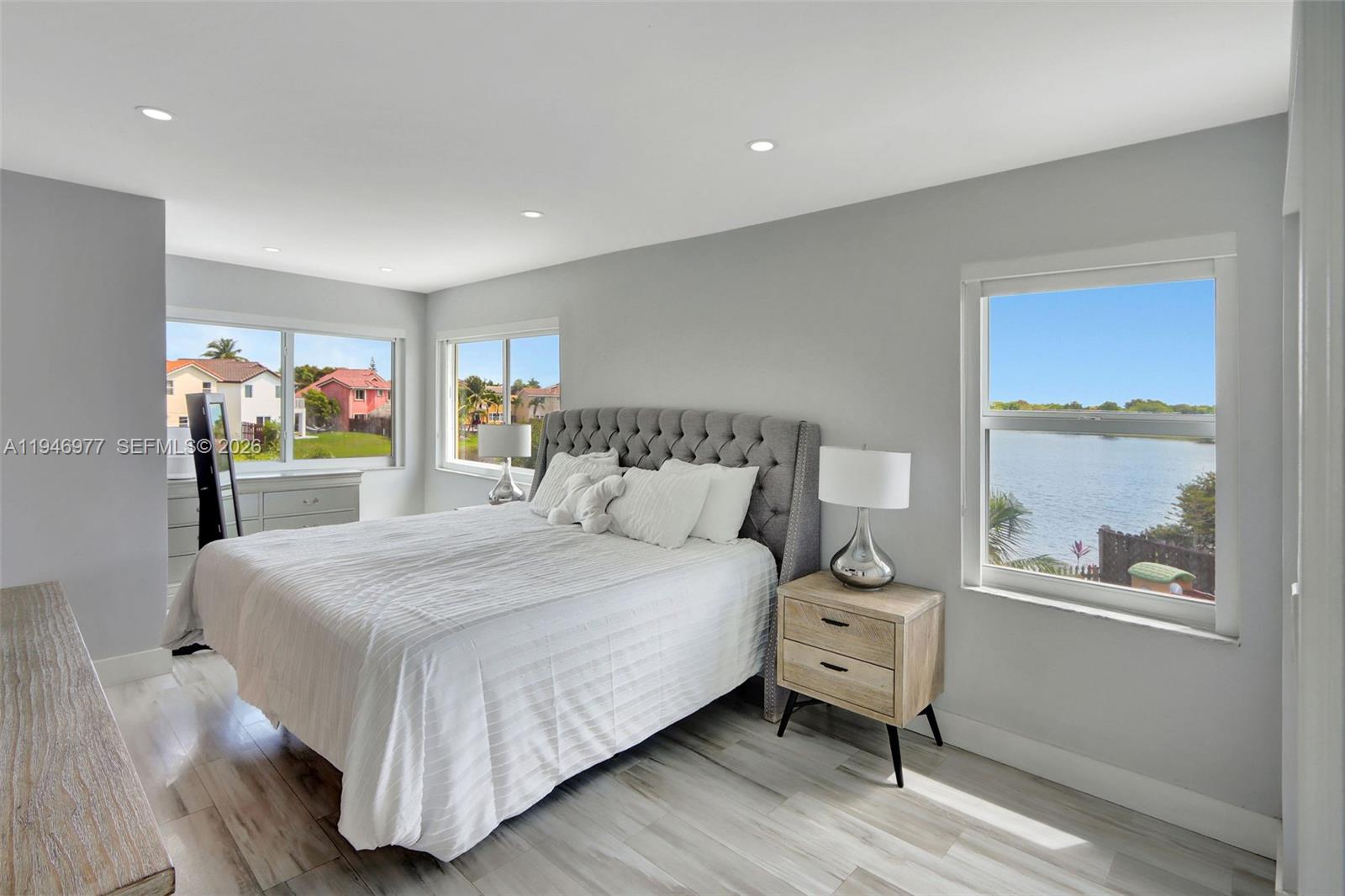 15481 Southwest 47th Terrace, Unit 15481 Miami, FL 33185 - Photo 22 of 29 a bedroom with a bed and a window