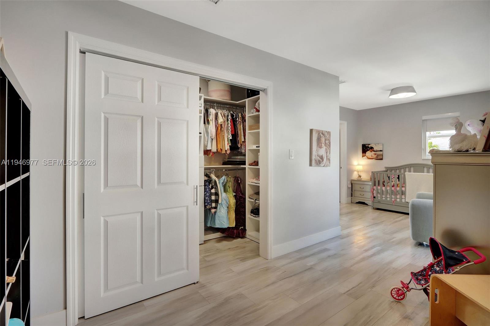 15481 Southwest 47th Terrace, Unit 15481 Miami, FL 33185 - Photo 26 of 29 a view of a workspace with furniture and wooden floor