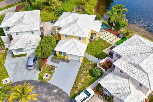 aerial view of a house with swimming pool