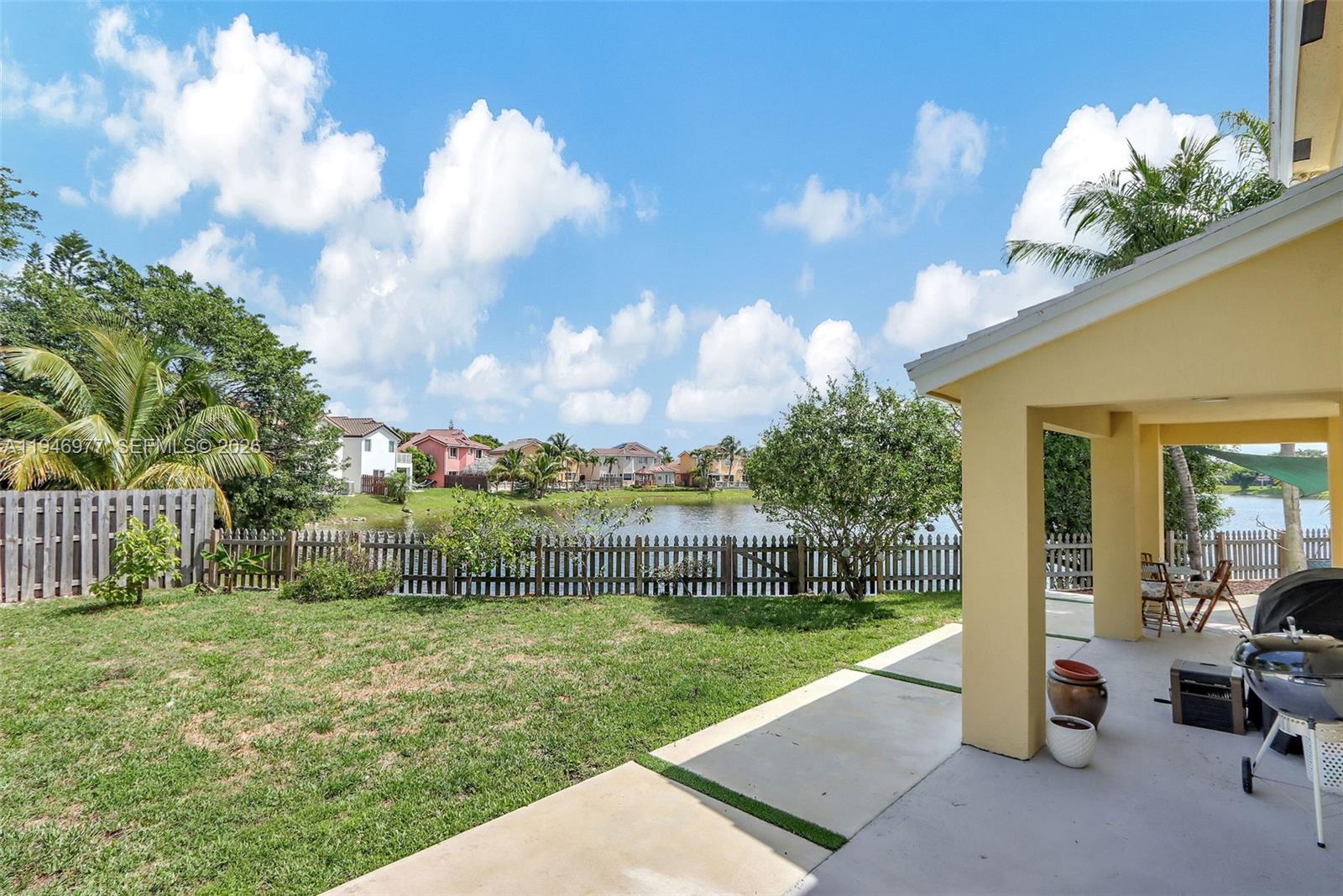15481 Southwest 47th Terrace, Unit 15481 Miami, FL 33185 - Photo 8 of 29 a view of a garden with a slide