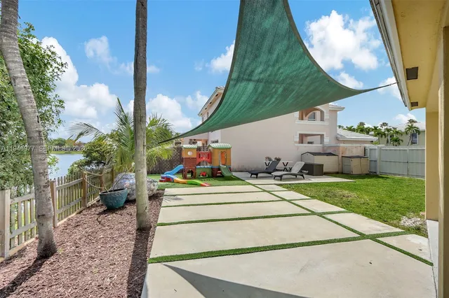 a view of a backyard with a garden