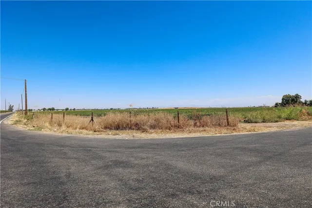a view of a road with an ocean view