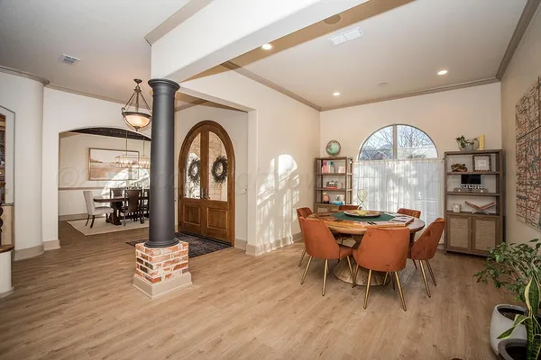 a view of a dining room with furniture