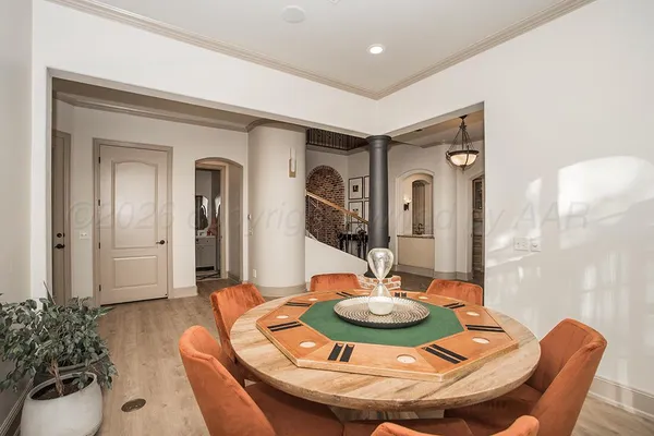 a bedroom with a bed and a table
