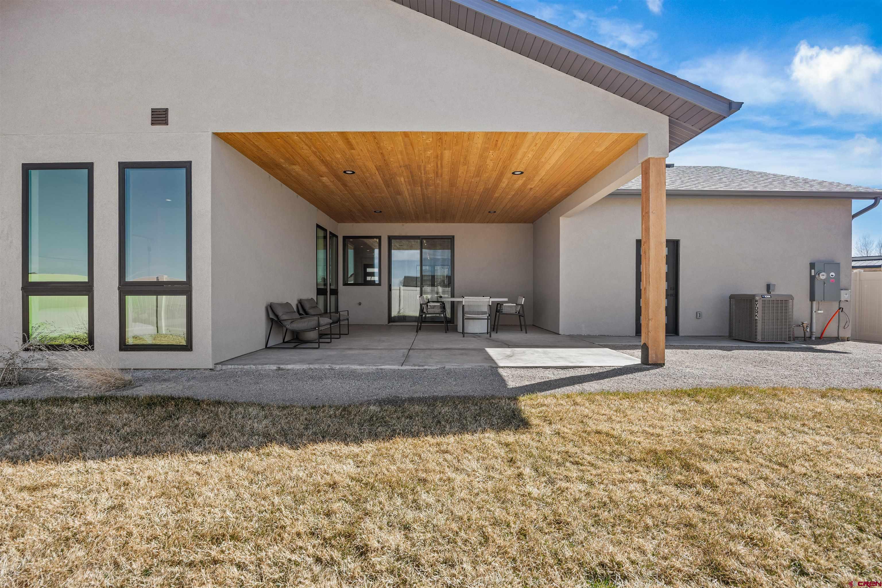 3435 Kestrel Loop Montrose, CO 81401 - Photo 29 of 34 a view of a living room and a rug