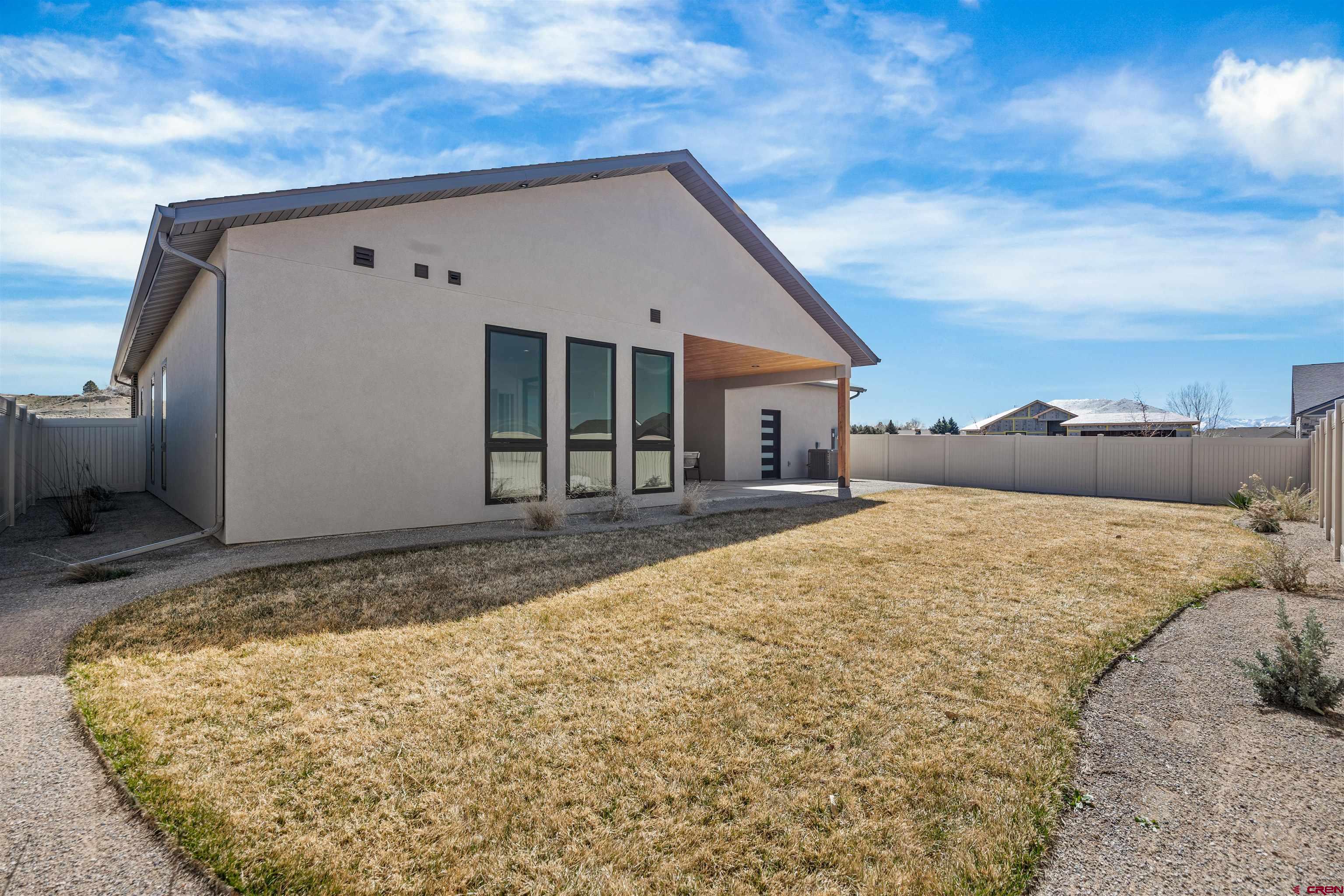 3435 Kestrel Loop Montrose, CO 81401 - Photo 31 of 34 a view of backyard of the house