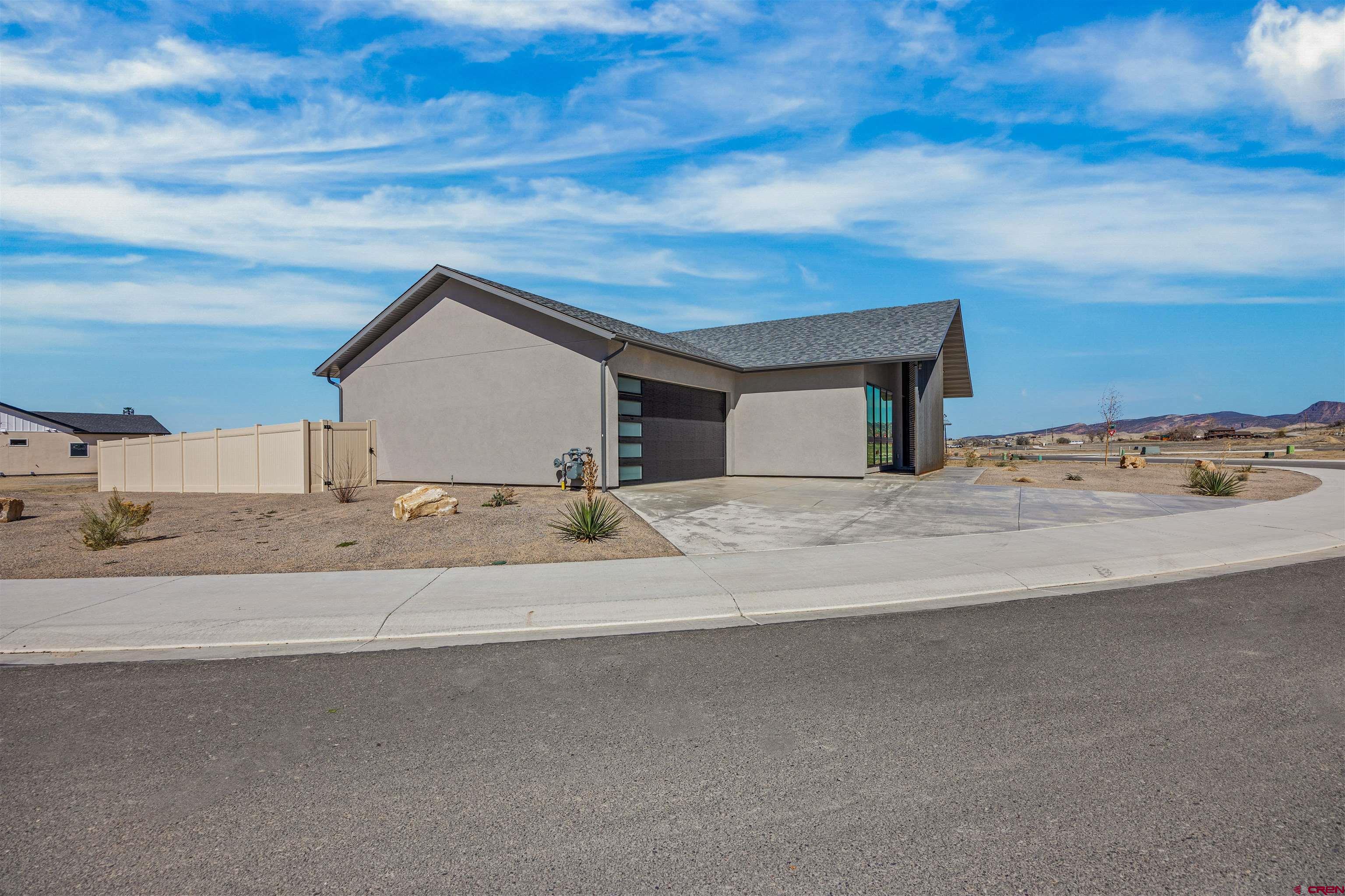 3435 Kestrel Loop Montrose, CO 81401 - Photo 34 of 34 a view of spacious house with a outdoor space
