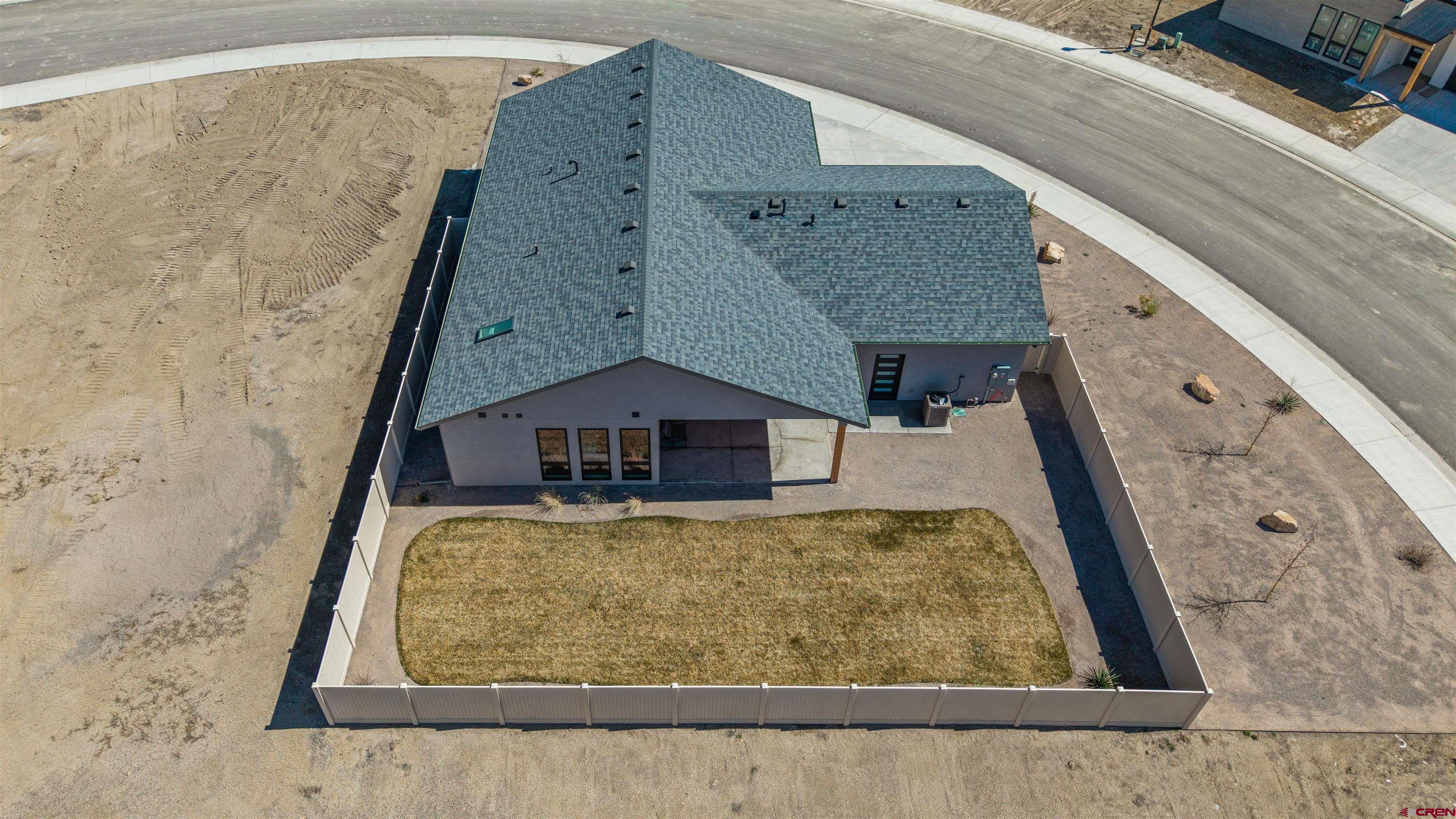 3435 Kestrel Loop Montrose, CO 81401 - Photo 4 of 34 front view of a house with large windows
