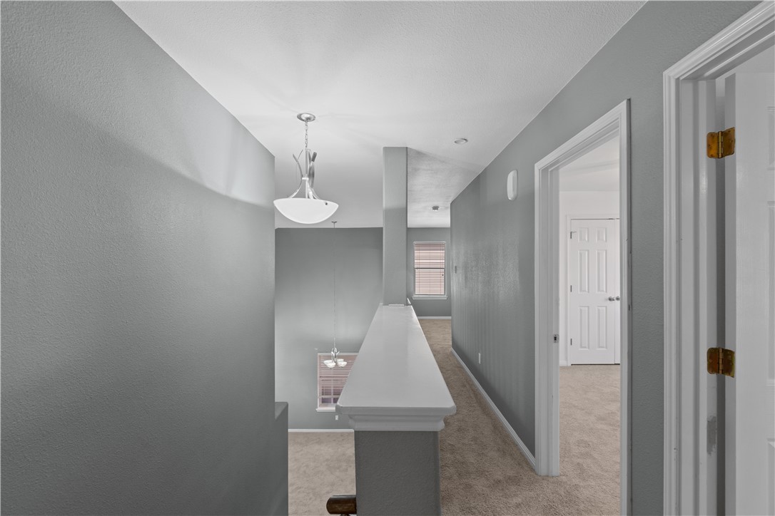 1533 Lorson Loop Round Rock, TX 78665 - Photo 12 of 27 a view of entryway and hall with a wooden floor